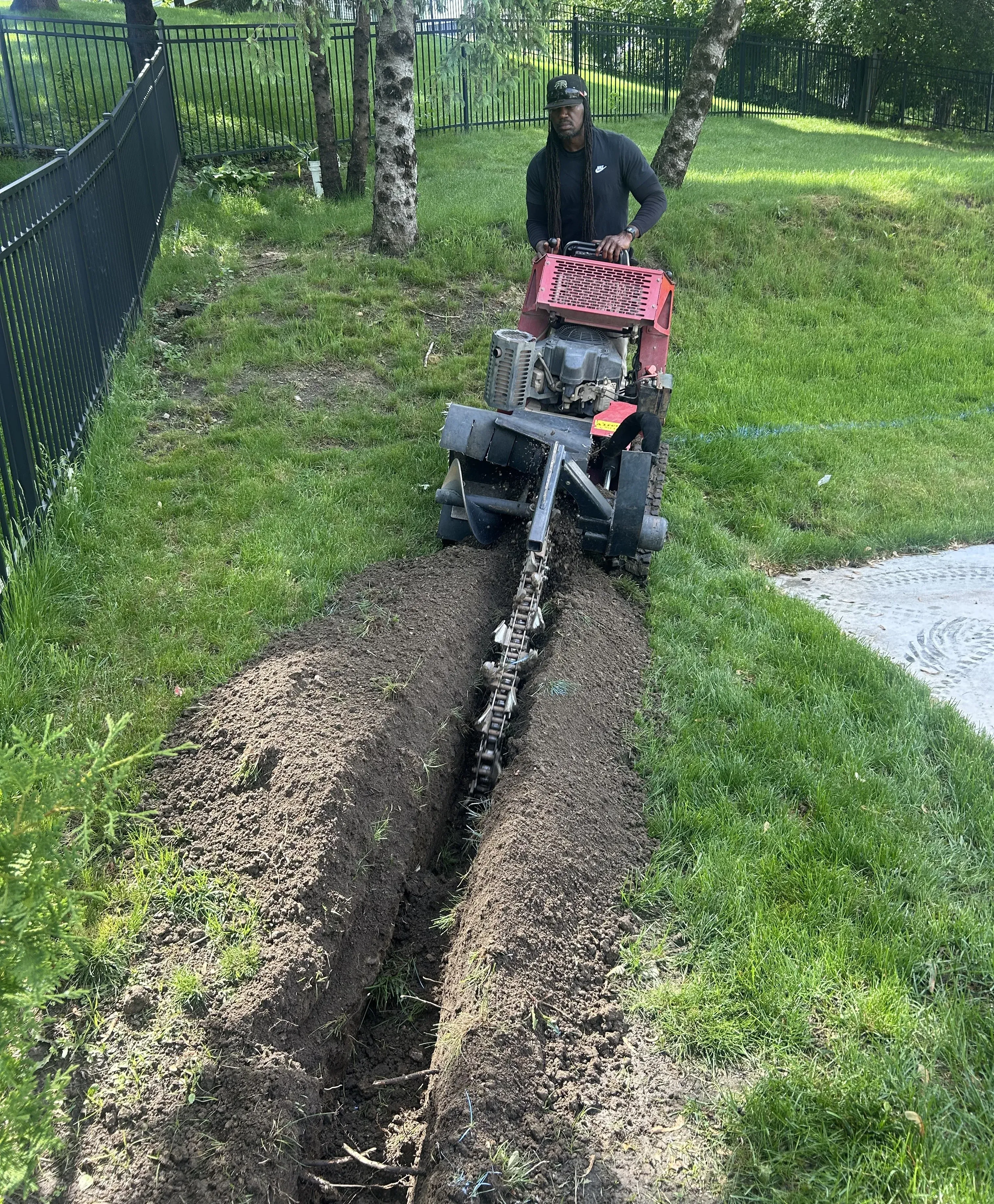 Catch basin and buried downspout completion