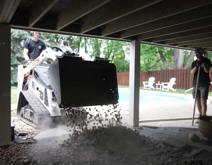 Samples of different landscape rocks including river rock and trap rock