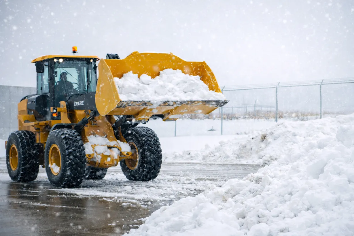 Skid Steer Snow Hauling and Relocation